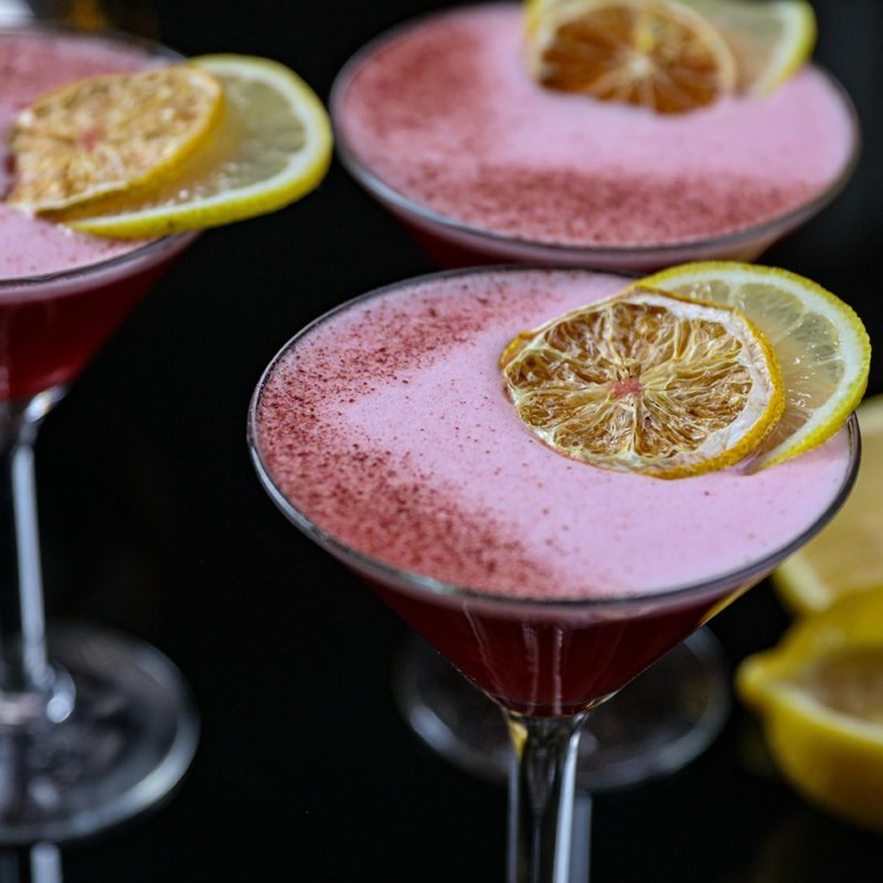 pink cocktails with lemon garnishes at perch and plow in santa rosa