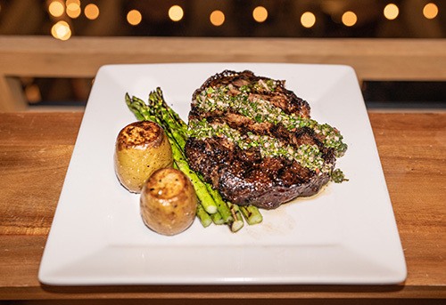 steak and potatoes at Perch + Plow
